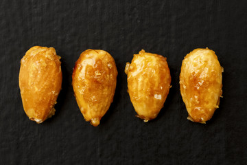 Sugar coated caramelised almonds.