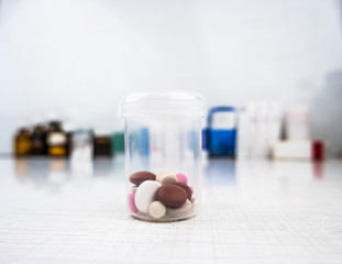 Drugs in a measuring cylinder