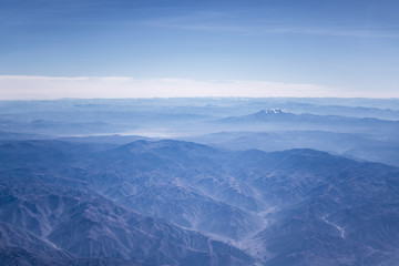 Fototapeta na wymiar Window Plane View of Andes Mountains
