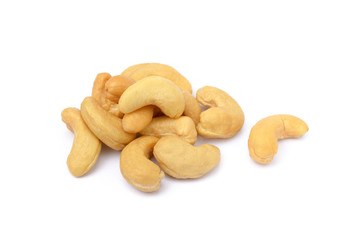 Tasty salted cashew nuts on a white background