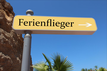 Fototapeta premium close up of airport signpost over blue sky