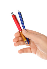 Hand giving pens