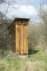 Wooden outdoors toilet, outhouse
