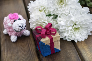 Spring flowers and gift box for March 8, International Women da