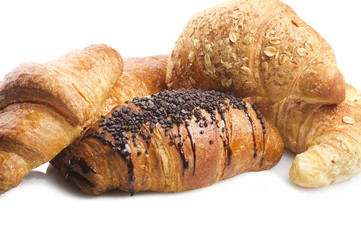 various types of croissants  on a white background