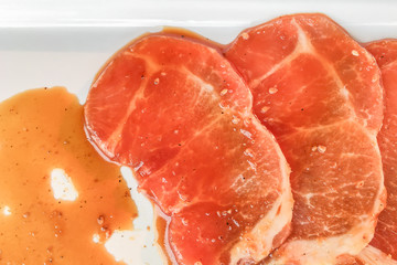 Fresh pork slices with sauce for bbq