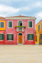 Colorful apartment building in Burano, Venice, Italy.