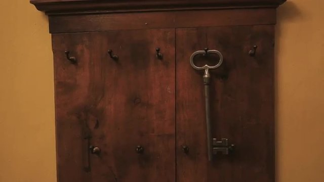 Old vintage key hanging at the key wall