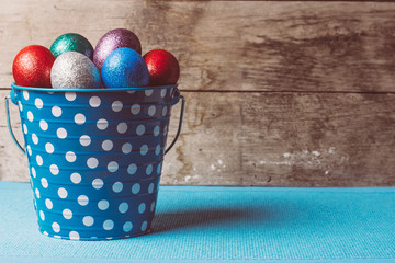 Easter Eggs In blue Tin Bucket