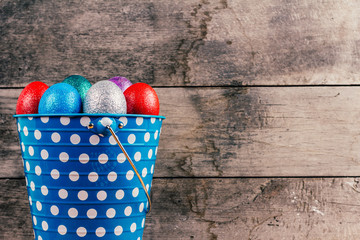 Easter Eggs In blue Tin Bucket