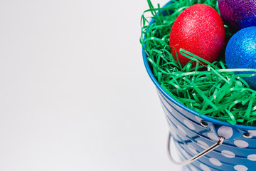 Easter Eggs In blue Tin Bucket