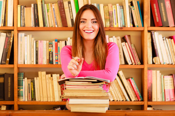 Girl student in college library
