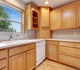 Simple kitchen with hardwood floor.