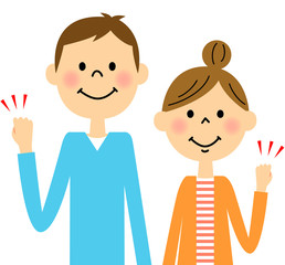 若い夫婦　ガッツポーズ