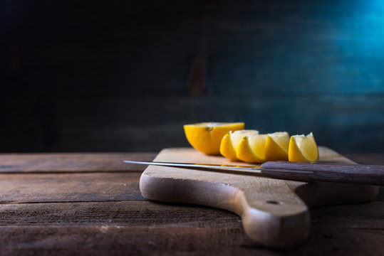 lemons cut on a cutting board