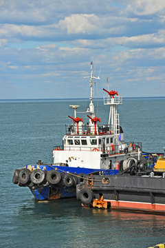 Tugboat in harbor quayside on Odessa, Ukraine