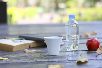 Stock Photo:.A cup of coffee and an apple
