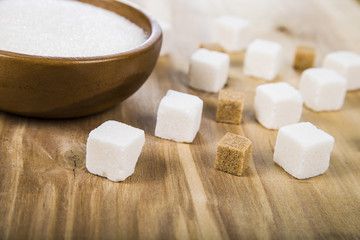 Sugar in a wooden bowl