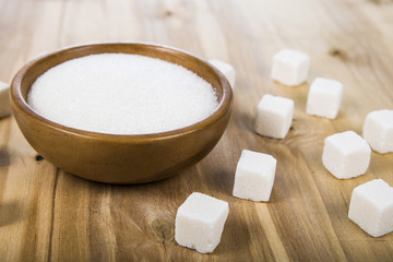 Sugar in a wooden bowl