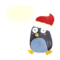 retro speech bubble cartoon penguin in christmas hat