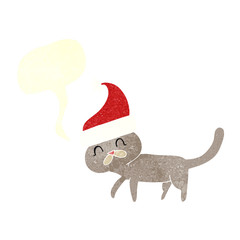retro speech bubble cartoon cat wearing christmas hat