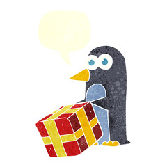 retro speech bubble cartoon penguin with christmas present