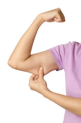 Woman holding under arm to check flabby muscle,excess fat