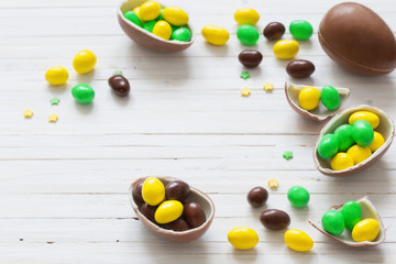 Chocolate Easter Eggs Over Wooden Background