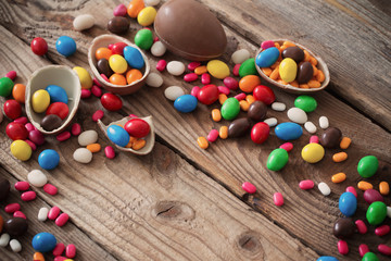 Chocolate Easter Eggs Over Wooden Background