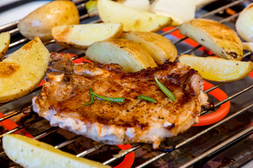 Pork steak on grill