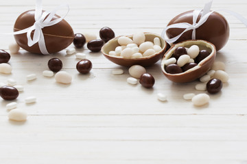 Chocolate Easter Eggs Over Wooden Background