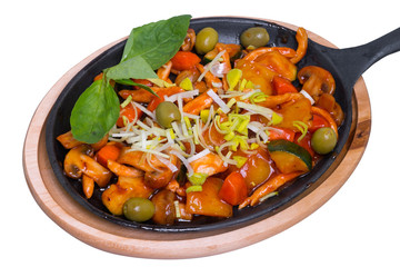 Fried chicken with vegetables and mushrooms, isolated
