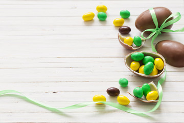 Chocolate Easter Eggs Over Wooden Background