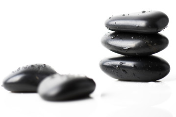 Hot spa stones on white background