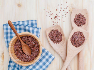 Alternative health care and dieting flax seeds in wooden spoon s
