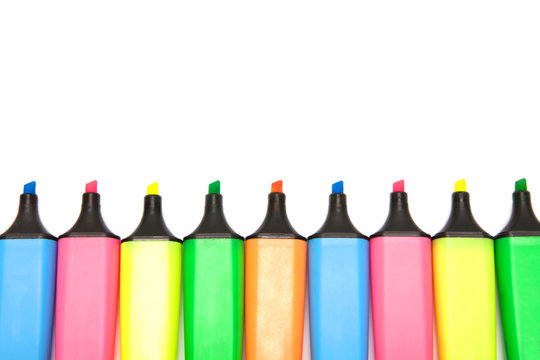 Colored highlighters set on white background.