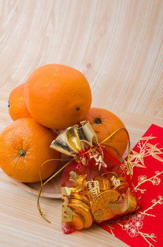 Chinese New Year - Mandarin orange, gold sycee (Foreign text mea