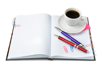 stationery and cup of coffee isolated on white background