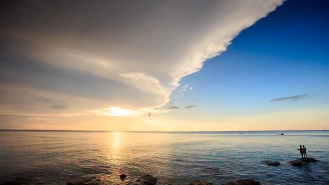 Sunlight Reflection Sunpath Fishermen in Sea at Sunset
