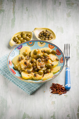 potatoes salad with green olives capers and hot chili pepper