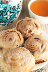 Homemade cinnamon rolls with tea breakfast