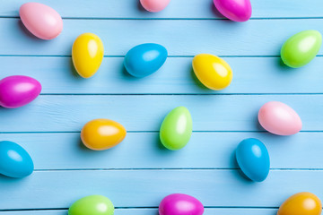 Naklejka na ściany i meble Easter eggs on a wooden background
