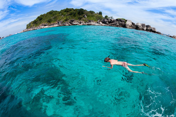 skindiving in the sea with goggles and a snorkel