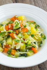 Vegetable minestrone with orzo pasta, zucchini, capsicum, potato