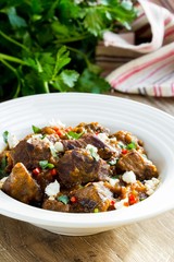 Traditional meat stew with beef, vegetables, feta cheese
