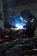 dramatic view of a worker