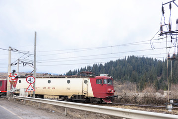 Fototapeta na wymiar A train in Romania at Vatra Dornei mountains