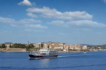 Fototapeta na wymiar ferry boat sails close to Corfu town
