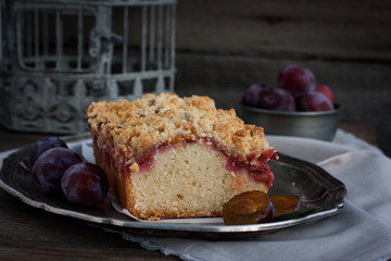 Fruitcake with plums, horizontal