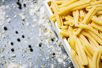 uncooked pasta in a box